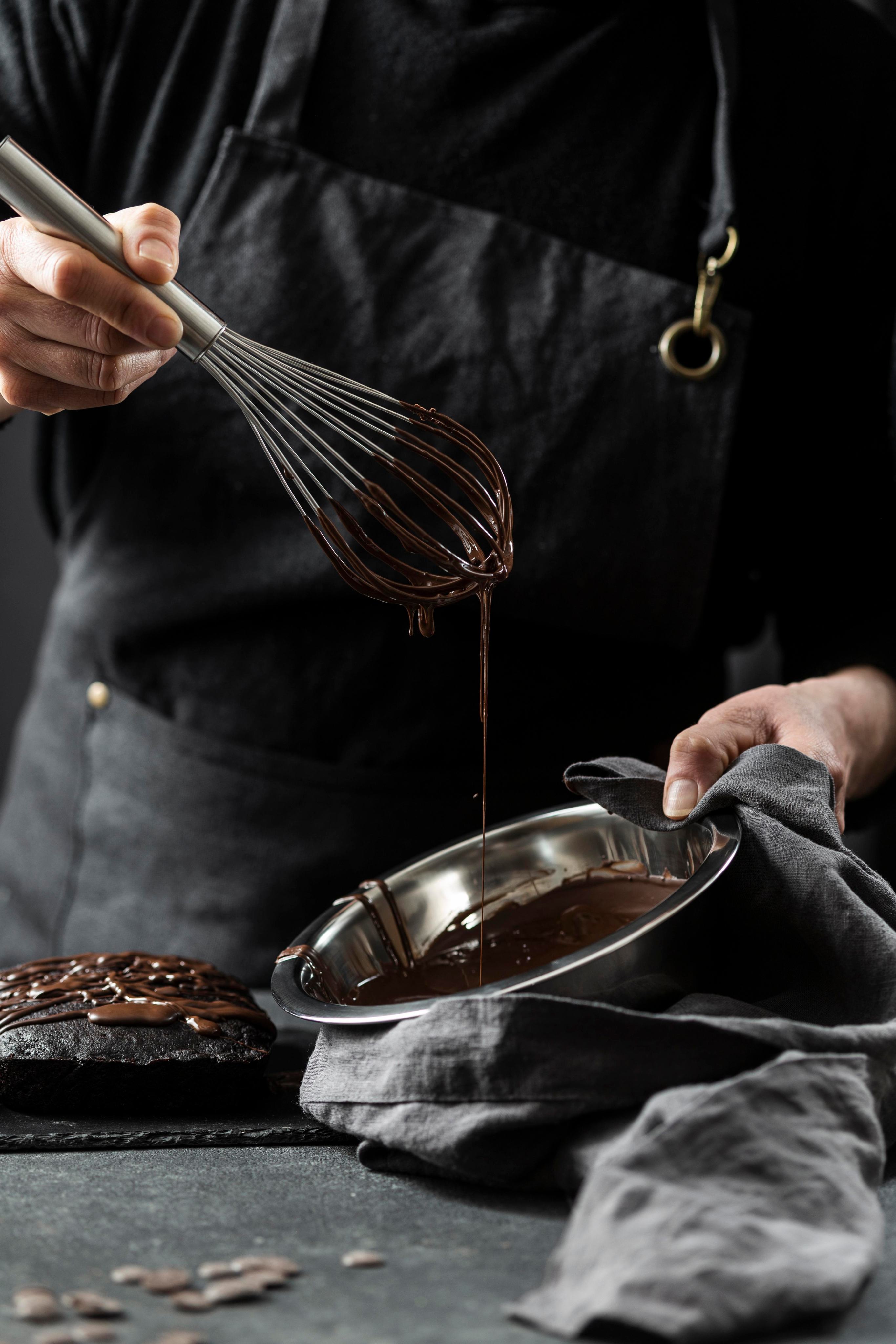A baker preparing chocolate cake