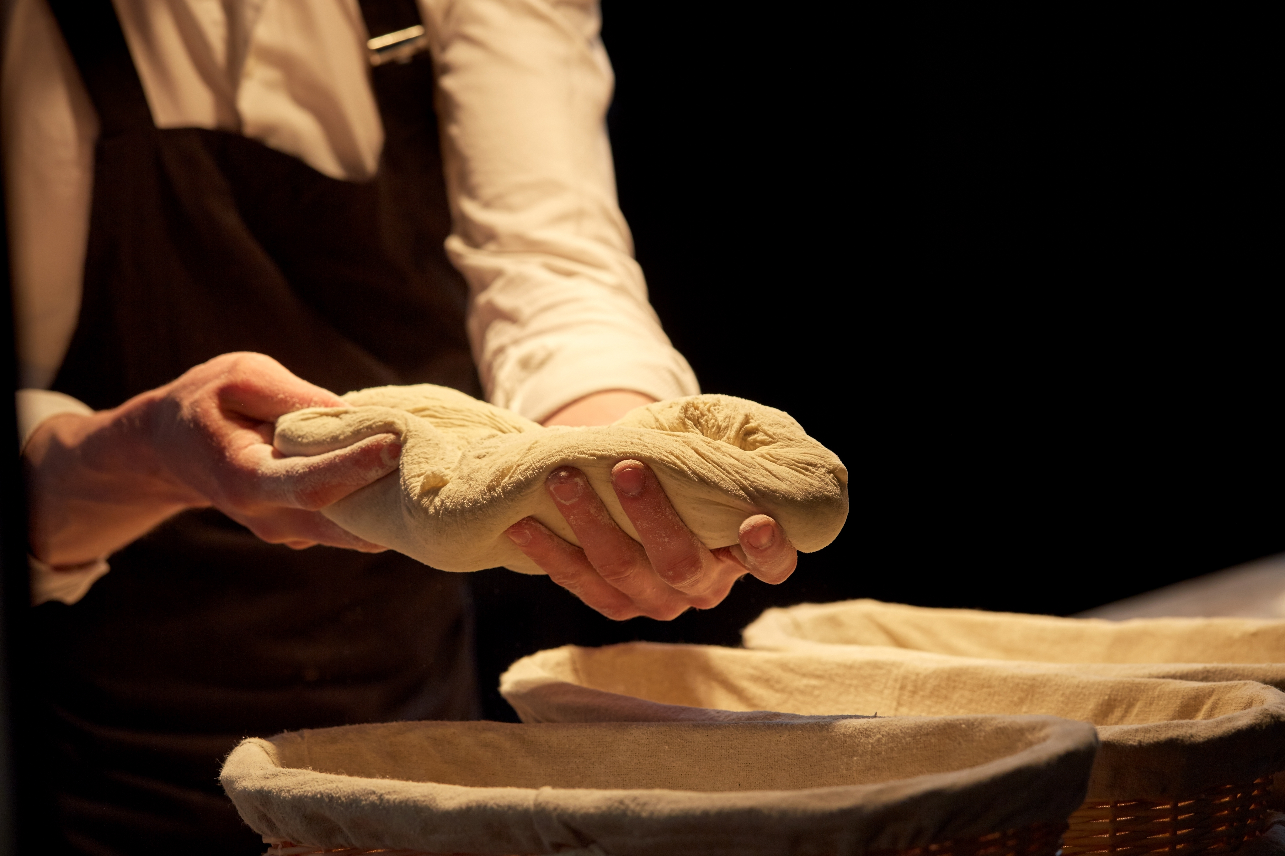 TurtleHip bakers shaping a cake by hand